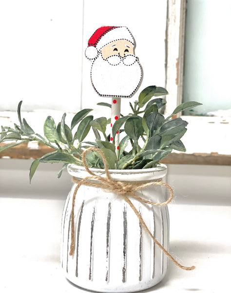 Seasonal floral arrangement, white rustic vase