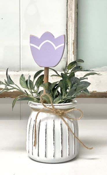 Seasonal floral arrangement, white rustic vase