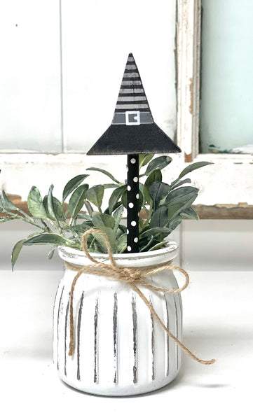 Seasonal floral arrangement, white rustic vase