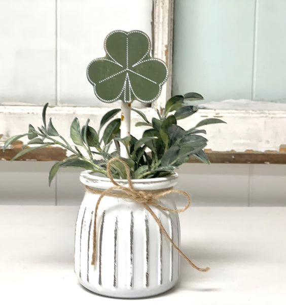 Seasonal floral arrangement, white rustic vase