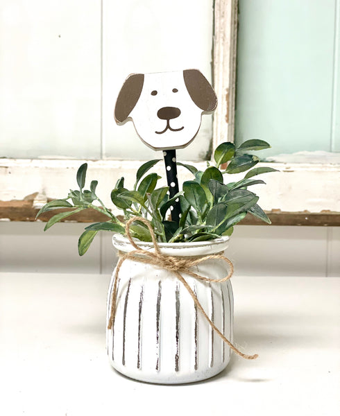 Seasonal floral arrangement, white rustic vase