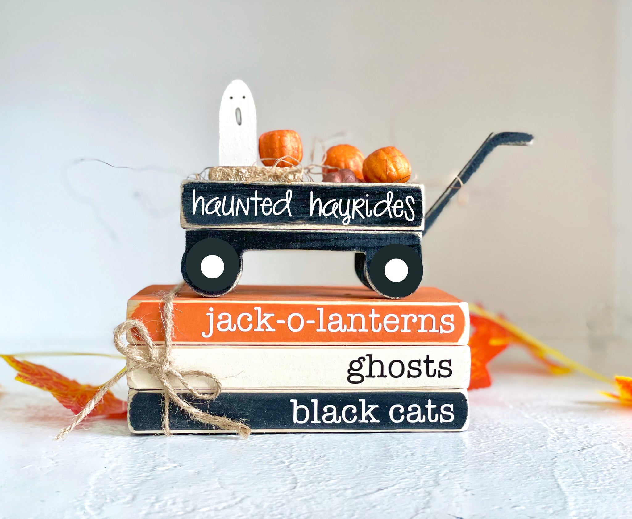Halloween faux book stack with ghost wagon
