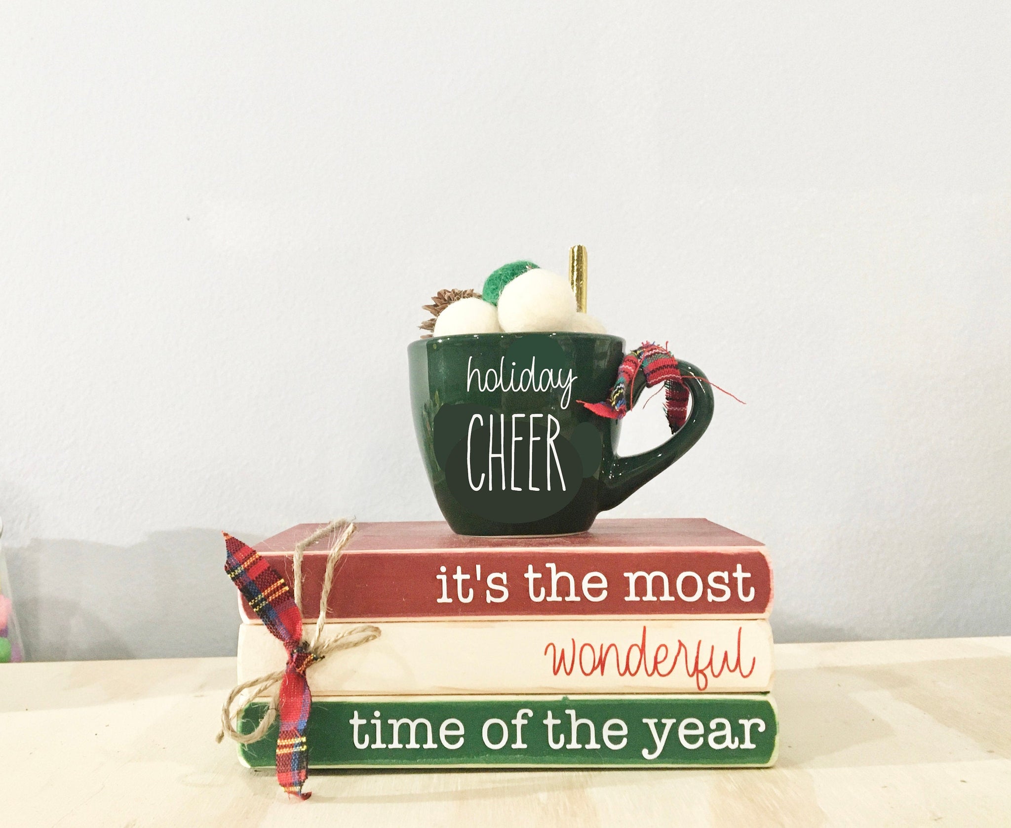 Holiday tiered tray, Christmas books, Tiered tray decor, Holiday cheer, Book stack, Christmas decor, glass mug, It's the most wonderful time