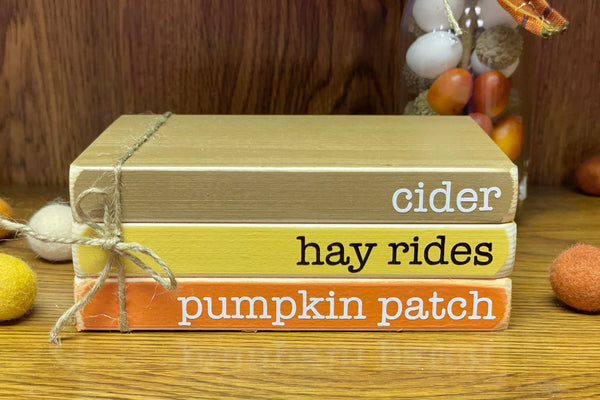 Fall books, Wooden book stack, Fall tiered tray decor, Faux hot cider mug